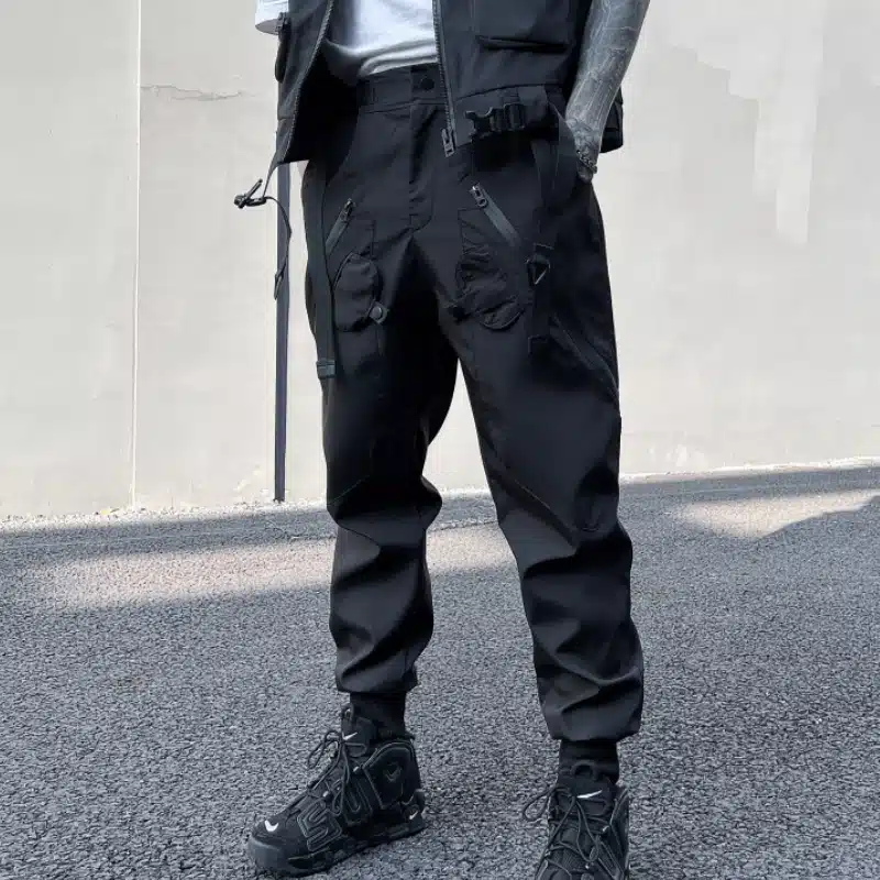 09af1e3b-3f8a-4637-82f6-2a4e186a1566.jpg Youth Black Loose Fit Overalls with Adjustable Drawstring Waist for Comfortable Spring Wear - Image 1