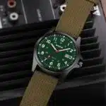Men's Nylon Strap Quartz Watch — Black Plastic Case, Date Window (Green Strap) - Image 2